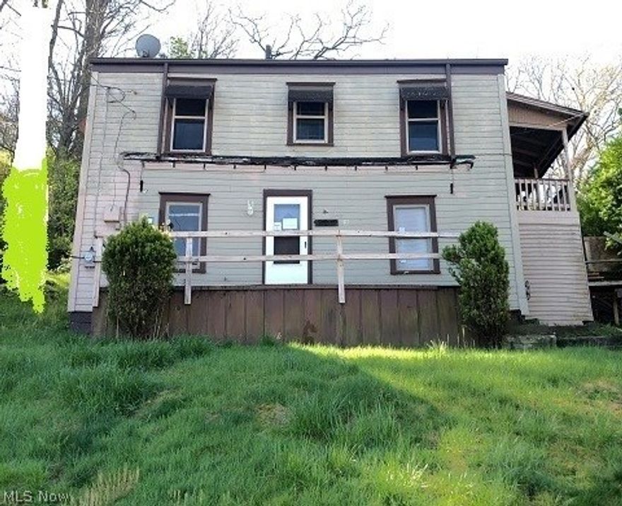 2 BR/1 Bath home features a main floor bathroom, living room, main floor Family Rm (could be used as main fl BR) & eat in kitchen, front & side porches. House needs some love, bring your remodel ideas. This is a Fannie Mae Homepath property.