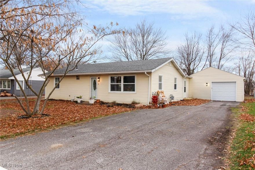 Welcome to 5212 Langfitt St., a well-maintained 3-bedroom, 1-bath home located in the heart of Vermilion. This expanded floor plan offers two dedicated living spaces, providing flexibility for everyday living and entertaining. The interior features brand-new carpet in all bedrooms, a fully updated bathroom with a new vanity and tub, and new kitchen appliances (2025). Major mechanical updates include two brand-new electrical panels with updated wiring, breakers and outlets, all new lighting throughout, a newer furnace and hot water tank. Both serviced in July as well as central air serviced in July. Outside, enjoy an expansive backyard deck and an oversized attached garage complete with a dedicated workshop and a new garage door opener that is still under warranty. Driveway apron and sidewalk also brand new summer of 2025. This move-in-ready home combines comfort, functionality, and peace of mind with thoughtful upgrades throughout. Schedule a private showing with your favorite realtor today!