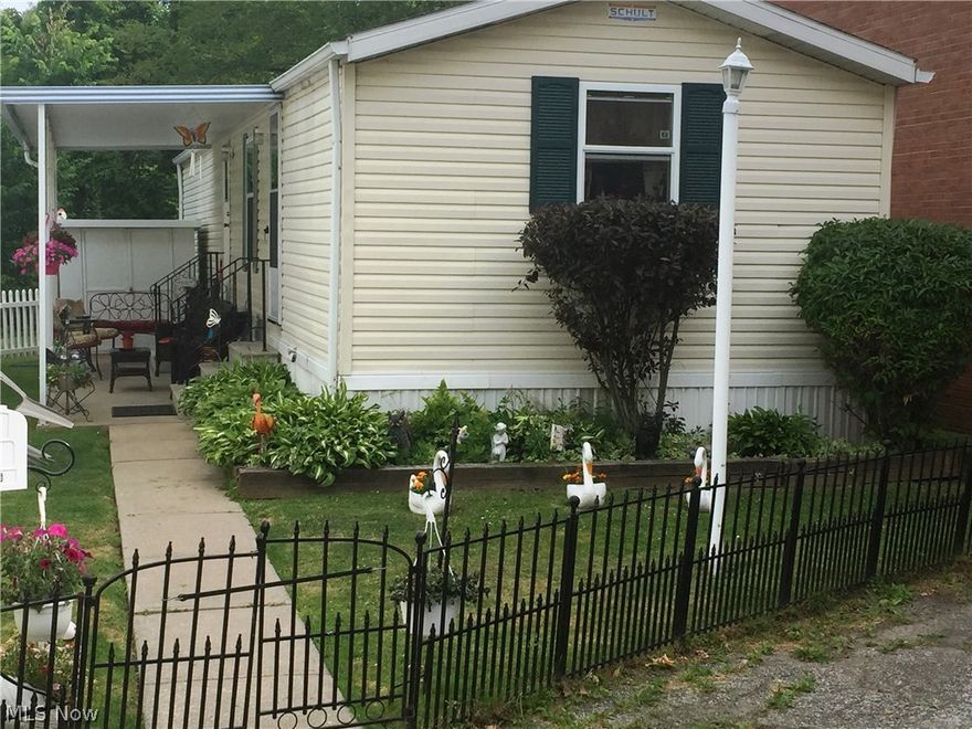 How cute is this! This adorable home is tucked back with a very private setting. This is a 1995 Schult measuring 14 x 60 or 840 sq ft. This home offers 2 bedrooms, 1 Bathroom with an open floor concept with reference to the living room and nice size eat in Kitchen. An absolutely adorable patio nicely decorated and a great backyard. New AC September 2016, Hot water tank in 2013. New flooring in Kitchen & Bathroom. House freshly painted in 2015