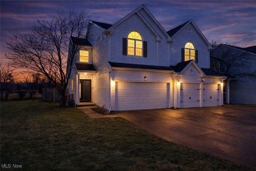 Completely updated, this beautiful end-unit home at 9796 Sugar Bush Dr in Olmsted Falls with a rare large side yard and open green space is truly move-in ready! The open and airy main living area features vaulted ceilings, skylights replaced in 2022, and a cozy fireplace that creates a warm, inviting atmosphere. The updated kitchen shines with white cabinetry, mosaic tile backsplash, stainless steel appliances (2023), and luxury vinyl plank flooring installed in 2023 that flows throughout the main level. The dining area opens to the fenced in backyard through sliding glass doors, perfect for entertaining or everyday living. Bedrooms are spacious and bright, including a vaulted primary suite complete with an attached private bathroom. Both bathrooms have been tastefully updated with modern finishes. The finished lower level adds valuable living space ideal for a family room, playroom, home gym, or office. Major updates include all new appliances in 2023 and a new furnace and A/C in 2024, providing energy efficiency and peace of mind. Outside, enjoy the privacy and extra space of the large side yard with green space, a rare find for this community. Conveniently located near parks, shopping, dining, and highways, and a very low HOA fee of $80 annually this home has it all!