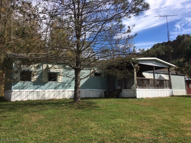 45+ acres of beautiful hunting, recreation or home site property. This property has been mowed/maintained regularly. Wide paths for easy access to pond in the middle of the land. Private setting. The property has a well, septic and pole building with electric. Large open mowed yard leads to a 3-bedrooms, 2 bath 1995 Skyline Tanglewood manufactured home (titled not real estate). Mobile sells "as is" as a result of water damage due to a plumbing break. This would make a nice project for use as a hunting retreat or weekend getaway. Land has a nice layout. Many possibilities. BUYERS - GATE IS UP. BUYERS WILL NEED TO WALK THE LAND WITH ADVANCE NOTICE. Seller does not own minerals.