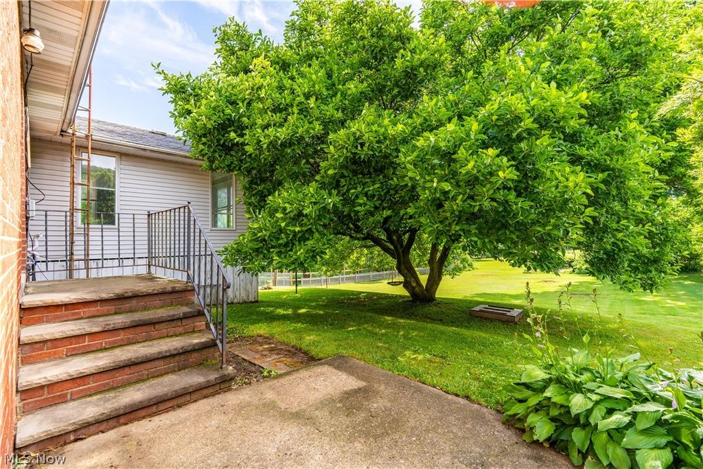 Photo of 500 N Marion Avenue, Louisville, OH 44641 (MLS # 5222772)