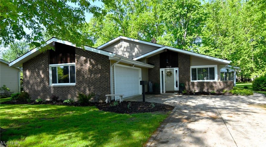 Absolutely beautiful 3 bed/1.5 bath vaulted split home featuring a gorgeous sunroom and deck situated on a lovely park-like lot. This home will "MOVE YOU." Nearly everything has been replaced or upgraded, including the stunning white kitchen with quartz counters, all brand-new stainless appliances, luxury vinyl flooring, and fixtures. The entire home has been freshly painted. A trendy wood plank accent wall has been installed, complete with an electric wall fireplace. The first floor showcases all new windows, including a slider to the modern sunroom with a retro freestanding fireplace. Both bathrooms have been gutted and remodeled. The family room features new carpet, paint, and recessed lighting. There is a special bonus room ideal for crafting, exercise, or use as a workshop. All bedrooms boast fresh paint and carpet, with hardwood floors beneath the carpet in two rooms. The furnace and air conditioning unit are less than 2 years old. Outside, you will find a beautiful deck and storage shed, all situated on a very nice treed lot that offers privacy. Open house Sunday from 2-4.