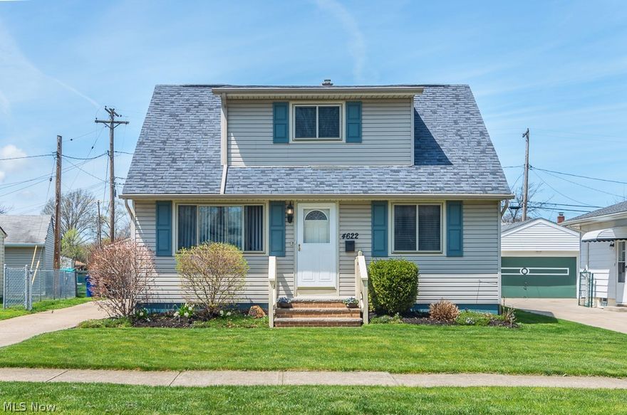 Move right into this fantastic 3 bedroom possible 4 bedroom cape cod with over 1500 sq ft of living space.  This home has been tastefully updated from top to bottom.  Enter the main door & you will pass through the spacious living room with hardwood floors as you enter into the updated kitchen complete with newer cabinets, countertops, tile backsplash, pantry & stainless steel appliances.  A formal dining room is located off the kitchen just steps away from the remodeled first floor full bath & bedroom.   As you head upstairs you will pass by an office nook on your way to master bedroom & the third bedroom, which could make a fabulous nursery.  The lower level features a finished family room, 4th bedroom & a 2nd full bath & laundry closet with laundry chute from above perfect for keeping that that dirty laundry hidden until it is time to wash.   Easy access out the side door to the completely fenced yard complete with, garden, swing set, patio area & 2 car garage.  Additional features