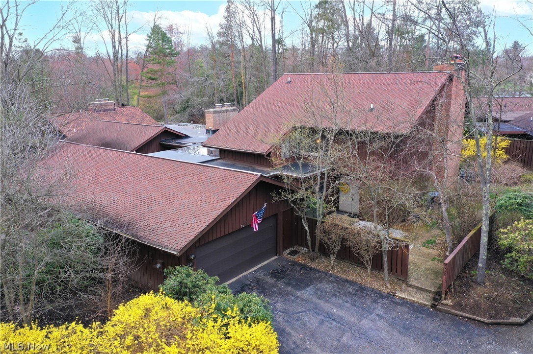 Welcome to this fantastic 3-bedroom, 2.5-bathroom condo nestled in the heart of The Pines, offering a blend of comfort and natural beauty in Kent! Upon entering, you are greeted by a spacious living area flooded with an abundance of natural light. The floor plan seamlessly connects the living room to the dining area and kitchen, creating an inviting space for relaxation and entertainment. Adjacent to the kitchen, sliding glass doors lead out to a charming patio, perfect for enjoying morning coffee. The nicely sized living room is complete with a wood burning fireplace and two large sliding glass doors to an oversized patio, perfect for entertaining. The master bedroom has impressive vaulted ceilings, access to a deck over looking the patio, and wood burning fireplace and is complete with an ensuite bathroom. The two additional bedrooms are generously sized with one having access to a private balcony to enjoy peaceful escape. This condo offers the perfect blend of convenience and suburban tranquility, making it an ideal place to call home. Call today for your showing!!