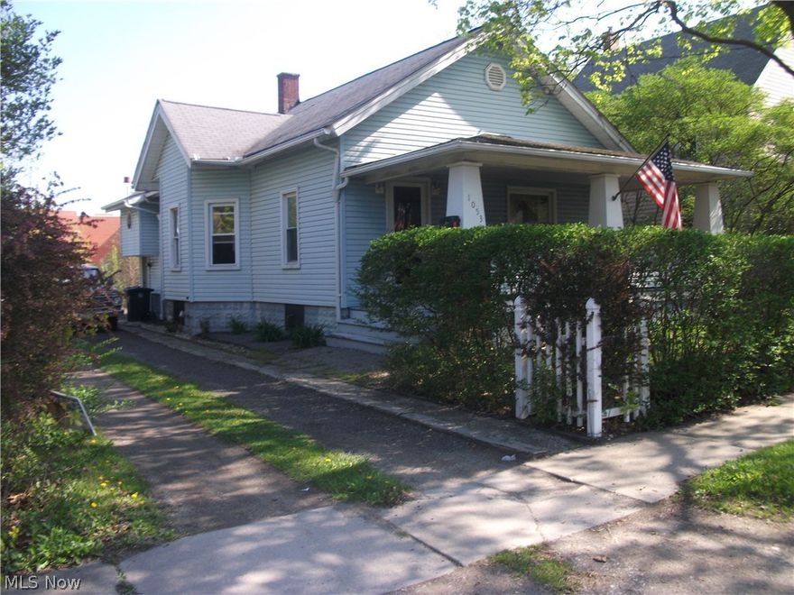 Get ready to be surprised! 20th century 1.5 story home. Could be a single family home or an investment property. Large front porch and large back deck! Privacy Hedges. Both BDR's on first floor. High ceilings. Beautiful original look cabinets; door and window frames. Gas fireplace. HUGE dining room. Very open & sunny!