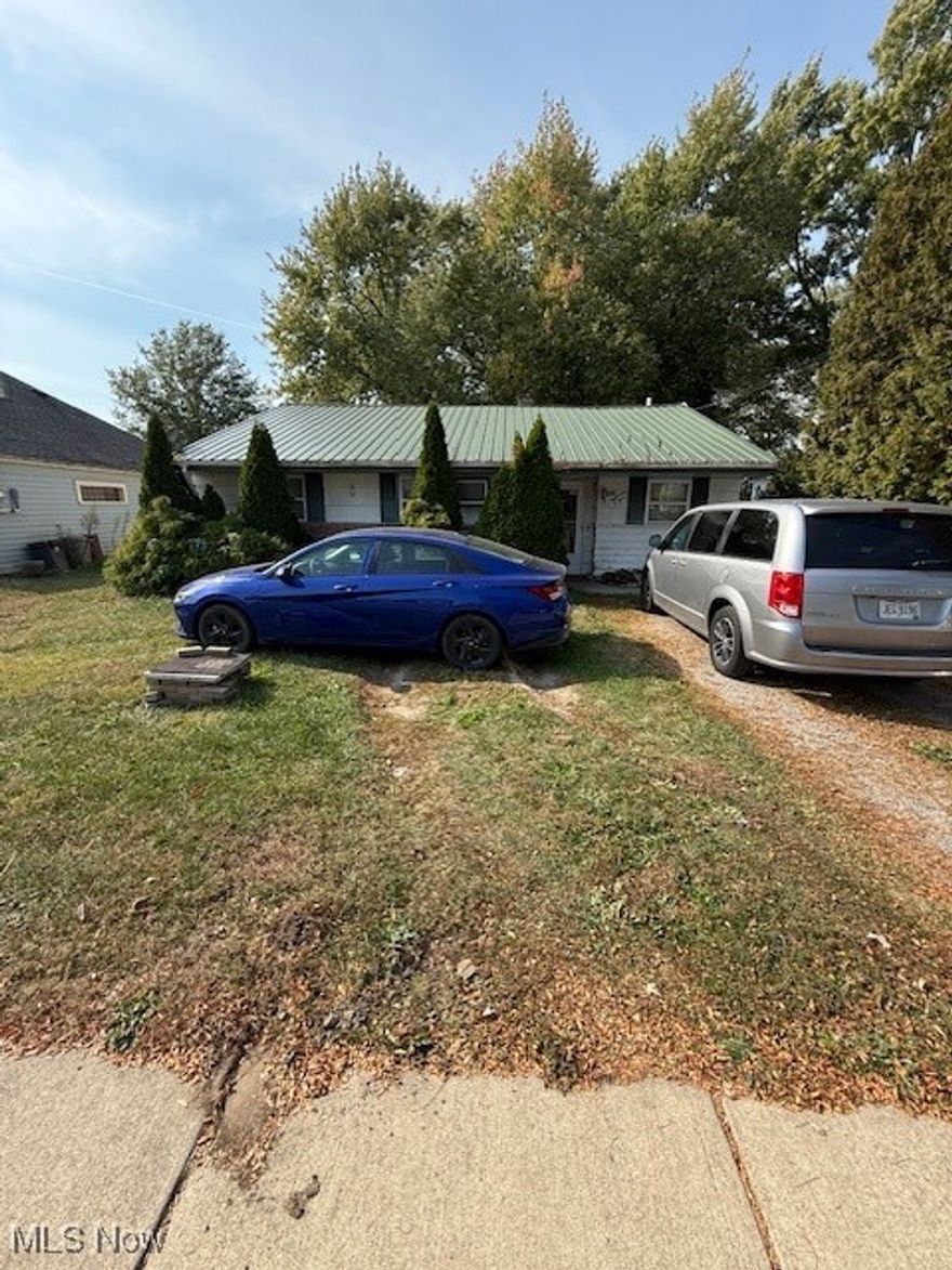 Solid 3 bed, 1 bath Sandusky ranch offering a fantastic opportunity! This structurally sound home is a blank canvas ready for your personal touch. Key features include a durable metal roof, a convenient 1-car attached garage, and the unique comfort of radiant floor heat in the kitchen, bath, and one bedroom. With a functional layout and great bones, a little TLC will make this gem shine.