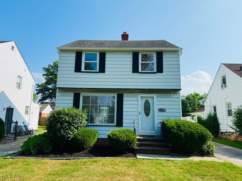 This beautifully restored 3-bedroom, 1.5-bathroom Colonial home perfectly blends classic charm and modern convenience. The home has been thoughtfully updated while preserving its timeless architectural features. The spacious living room boasts large windows that fill the space with natural light. The dining room is perfect for entertaining with ample space for a large dining room table. The kitchen has been completely updated with new cabinets and a sleek granite countertop. The upper level also features a well-appointed bathroom with modern fixtures and the three generously sized bedrooms that offer plenty of closet space, each with unique character and plenty of natural light. Outside, the home has a beautiful backyard with a sublime fenced-in yard & 2 car garage. The home retains its original Colonial appeal, with aluminum siding, and a welcoming front porch & updates include fresh paint, a younger roof, younger vinyl windows, AC, new kitchen cabinets, updated electrical, refinished hardwoods throughout, and newly install 1/2 bath in basement.