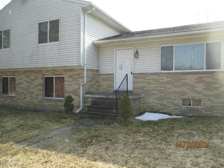 Sharp 3 Bdrm 2 Bath 2798 Sq Ft Sided Split Level Home on almost 12 Acres with 2 Car Attached Garage, Eat in Kitchen, Family Room with Fireplace, Master Suite, Partial Unfinished Basement and so much More!  Property is being Sold As-Is and is subject to HUD Guidelines 24 CFR 206.125