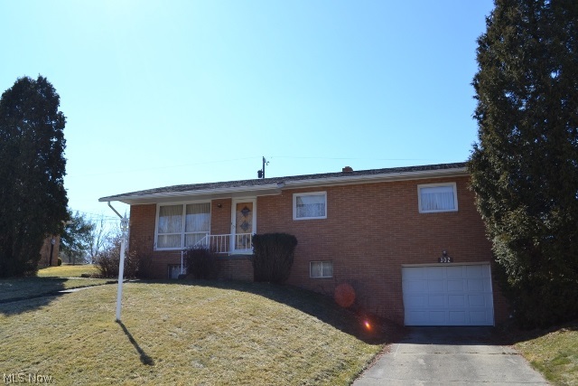Well cared for brick home. Very neat and clean Freshly painted. Kitchen has been updated including ceramic flooring. Covered patio off back. Fourth bedroom and L shaped family room in basement. Hard wood floors under carpet on main floor per seller. All appliances stay.