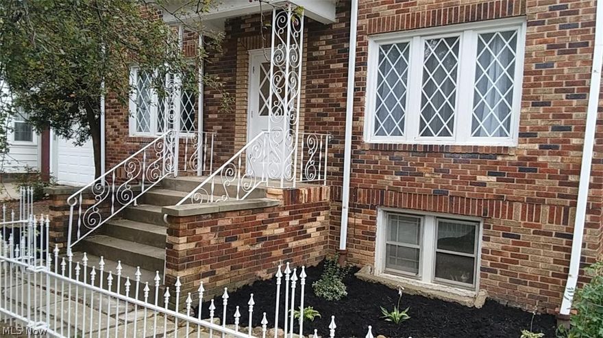 Awesome apartment near the Western Reserve Hospital in Cuyahoga Falls! Huge Living Room and Dining Room with lots of natural light through the several windows. The apartment goes the entire length of the building and has a bedroom on each end, the small front bedroom would be well suited as an office or guest area and has a closet. The kitchen is clean and bright with an electric stove. Tenant pays electric ONLY, the heat is paid by the Landlord! There is an eat-in area in the kitchen for a table and chairs or add a Bakers Rack or Pantry Cabinet there & eat in Dining Area! Bathroom is nice & light with tile surround around the bathtub & shower combination. Fresh recent durable wood look flooring in the kitchen, dinette area, hall & bathroom! You'll even have your own garage door opener and garage space for indoor parking &/or storage! The laundry is coin operated in the basement level along with a locker for your use. Great landlord who has property professionally plowed and lawn care,