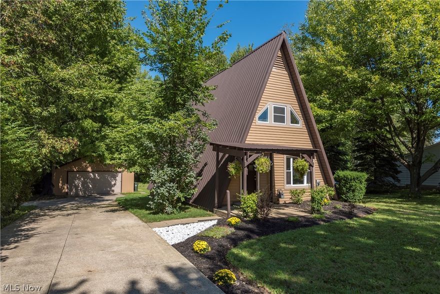Beautifully updated A-Frame with a spacious open floor plan. The partially finished basement adds plenty of extra space to utilize. With one bedroom on the first floor and two on the second floor, it's perfect for any living situation. Enjoy plenty of relaxation on the back deck with peaceful views of the tree lined yard. Updates within the last couple years include all kitchen appliances, heat, A/C, water heater, sump pump, granite countertops, all flooring, Anderson windows, kitchen countertops, Moen fixtures, and front and rear door. Don't miss the opportunity to own this unique modern home!