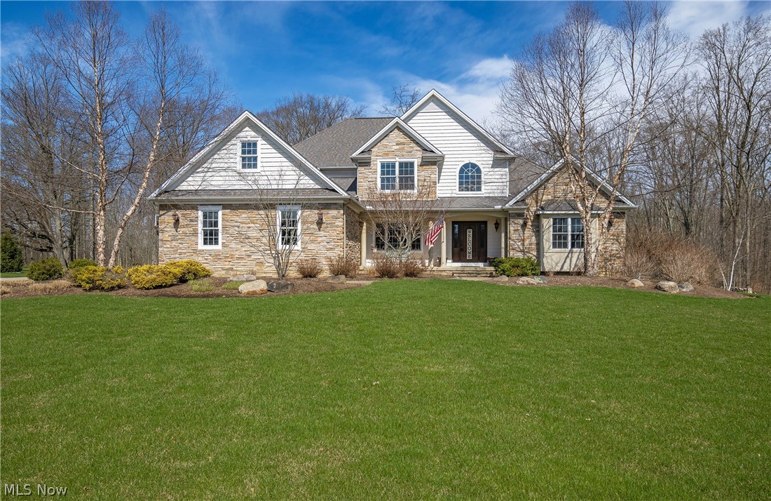 Welcome home to 9680 Nighthawk Drive! Nestled on a 2.5 acre lot in the desirable Amber Trails development, this stunning 2011 conventional home boasts 4 bedrooms, 3.5 bathrooms, and 3400 sq ft. Enter into a grand foyer with a nearby formal dining room, office, and bar. Find your culinary inspiration in your beautiful kitchen complete with stainless steel appliances, Brazilian Cherry hardwood flooring, granite countertops, and Cherry cabinets. A second dining area features a walk-in pantry and gives access to the back deck (2015). Continue into the two story great room offering a cozy fireplace. The owner's suite includes a sizable bedroom, walk-in closet, and large bathroom with a double sink vanity. The laundry room is conveniently located on the main level along with a half bathroom. Venture upstairs to find the remaining three spacious bedrooms, one featuring an attached bathroom. The second full bathroom down the hall offers an additional walk-in closet. You will not run out of storage space with this full basement and three car garage! The lower level walks out to a beautiful side patio, perfect for your summer evenings. Notable updates include: paver walkway (2013), side patio/firepit (2014). Don't miss your opportunity to own this home. Schedule your private tour today!