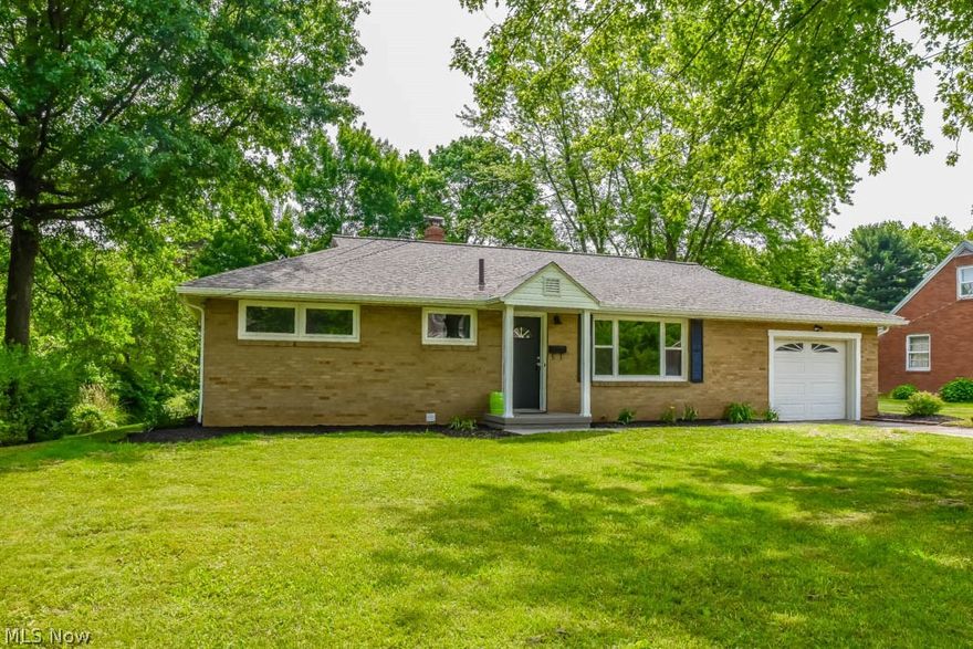 Wonderfully remodeled 3 bedroom, 2 full bath all brick ranch with a finished lower level in Perry! Home has already been inspected for buyer's peace of mind. New flooring and fresh paint throughout! The spacious, sun-filled living room features a large picture window and deep coat closet. Prepare your favorite dishes in the beautiful eat-in kitchen updated with granite countertops, a breakfast bar, stainless steel appliances, new cabinets and tile flooring. Sliding glass doors lead to the huge sun room with gorgeous views of your private backyard. Down the hall, there are 3 nicely sized bedrooms and a lovely full bath with granite countertops, new fixtures, tile flooring and ceramic tile shower surround. Enjoy extra living space on the finished lower level! There's a rec room with recessed lighting, a new full bath and a huge 39x12, freshly painted storage room with laundry. 1-car attached garage with new opener. Private backyard with a fire pit! Come see all this home has to offer!