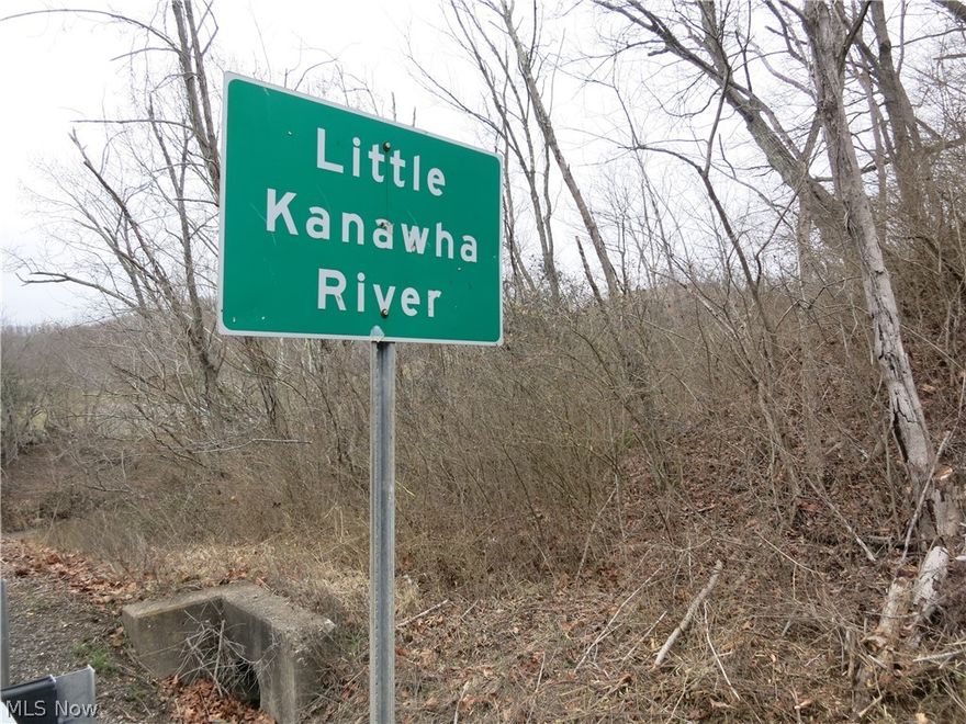 5.73 acre lot, borders on Little Kanawha River, near public access for boats, also borders on Little Kanawha Pkwy, owner reports free gas!