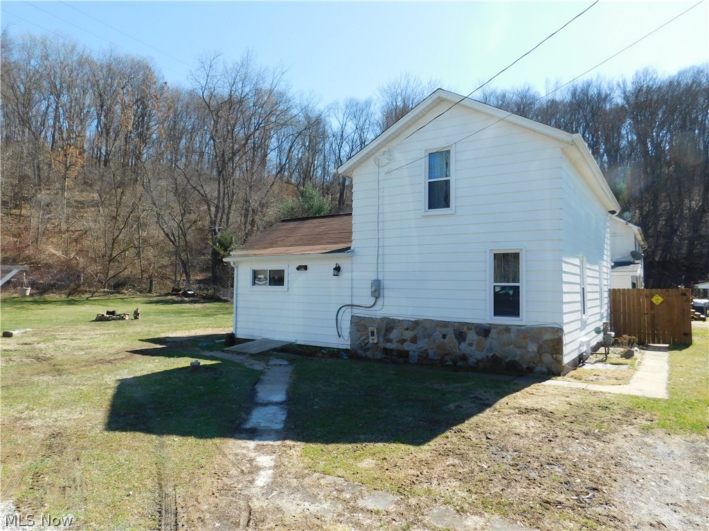 Move right in to this Cozy 3 Bedroom Home Situated on 1.27 acre with 2 car detached Garage. New List includes: 2017 Kitchen-Amish Cabinets (Solid Hickory), Flooring, Refrigerator, Stove, Microwave, Dishwasher; Entire Home- Windows, Seamless gutters, Gas Furnace. For additional heat there’s also an outdoor woodburner to keep warm throughout even the coldest of winters. There’s also a nice fenced in area for pets.