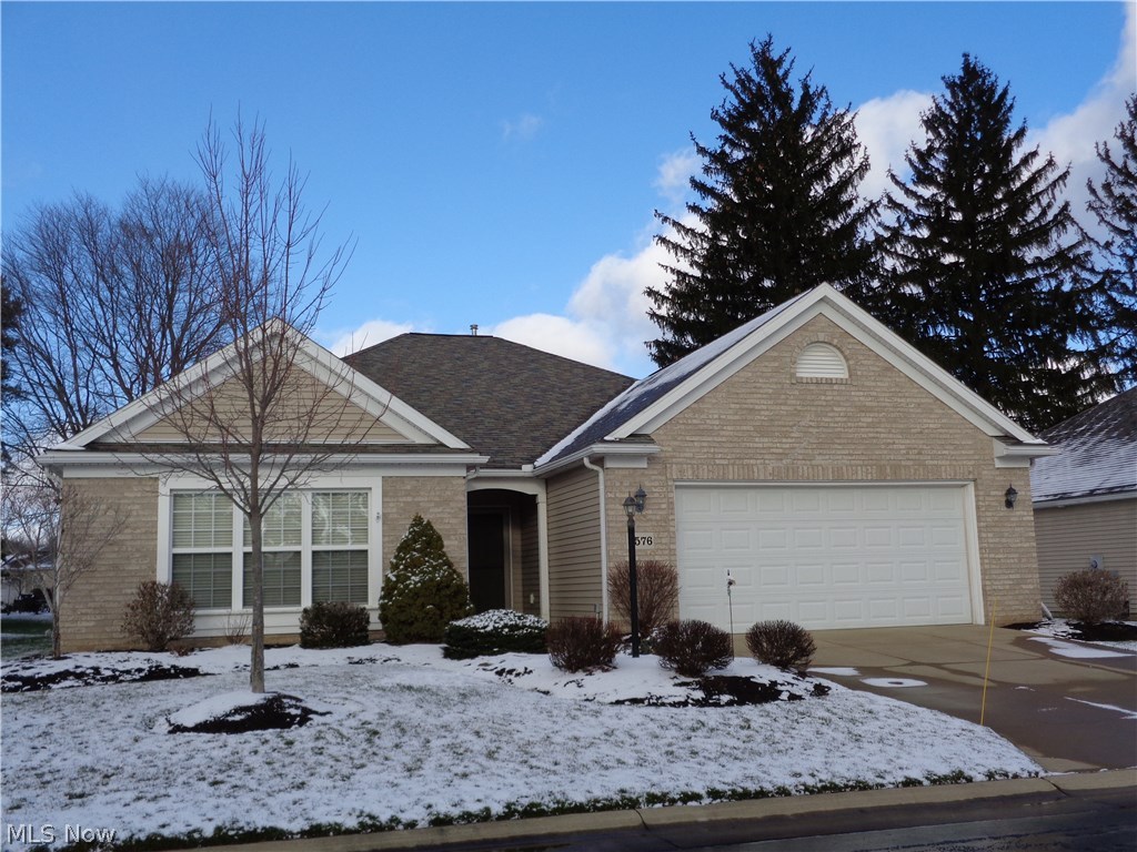 Free Standing Cluster Home- Wonderful larger 3 bedroom home with 2 full baths and 2275 sq ft. Vaulted foyer, master bedroom, sun room, and kitchen. Great Room with gas log and blower fireplace. Four seasons sun room with door to patio. Kitchen tile flooring, double wall ovens, gas cook top with tile backsplash, microwave, side by side refrigerator, dishwasher, garbage disposal, roll out tray drawers, island, and indirect lighting. Master suite full bath, 2 sinks, garden tub, walk in shower, and walk in closet. 1st floor laundry with washer, dryer, laundry sink, and cabinets. Upgraded 92% efficiency furnace with electronic air cleaner and humidifier. Larger garage 24 x 22, pull down attic storage floored with light, and fan, drain, built in shelf. Sprinkler system, neutral colors throughout ready to move in.