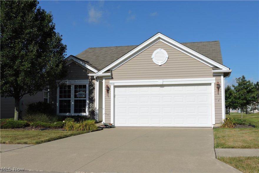 Wonderful ranch home in Pioneer Ridge, Northeast Ohio's premier 55+ active lifestyle community by Del Webb. This home features a master suite with a large walk in closet and private bath with walk in shower, a second bedroom and another full guest bathroom, fully equipped kitchen and laundry room. All appliances stay with the home, so just move in and start enjoying your resort style living. The home also features 9' ceilings throughout and a 4' extended 2 car garage with built in cabinets for additional storage. A great three season 10' x 20' enclosed patio across the back of the house offers park like views of the landscaped common area. There is also an adjacent open patio for your enjoyment of the beautiful back yard vista. Enjoy the 14,500 s.f. lodge with both indoor and outdoor pools, large exercise facility, reading areas, sun/card room, gathering/party areas and a large outdoor patio. Tennis, pickleball and bocce courts plus a walking trail throughout the community for your enj