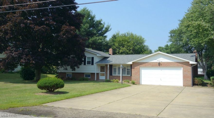 Wonderful brick split level located in the heart of North Canton close to Price Park, shopping and I-77.  Meticulously maintained home with a long list of recent updates that includes windows, shingles and furnace/AC.  Three bedrooms with gorgeous, warm hardwood flooring. Lovely eat-in kitchen with solid surface countertops and skylight allowing natural light to flow in.  12x53 covered patio overlooking a wonderful private sanctuary is a fabulous place for entertaining and family gatherings.  Nice  barn for extra storage. Huge oversized driveway with extra parking. This home is sure to please so make sure you schedule a private preview today!
