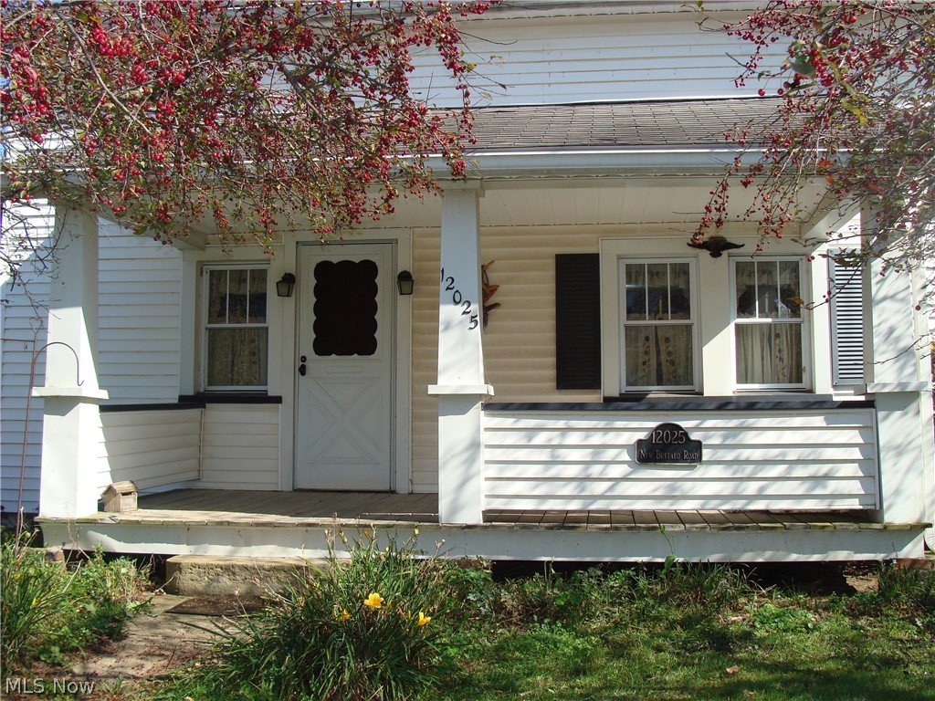 Unique country property almost one acre. South Range Schools. Salt box one & half story well loved home. One bedroom down & 2 bedrooms up. Large hallway upstairs w/extra storage. Living room open to dining room. Kitchen had an addition w/wood floor & wood burner. Newer tilt in windows. Vinyl siding, open front porch, back deck, barn/garage, cement driveway. Gas furnace & freezer in basement. Includes all appliances. 2 lots with house on southeast corner & 3 lots on northeast corner.