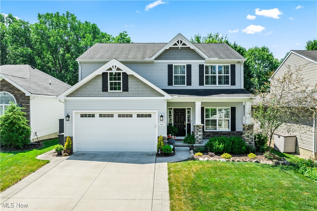 Welcome to this stunning home, where modern living meets natural beauty. Set on a picturesque lot with wooded water views, this property offers peaceful privacy and a fully fenced backyard, perfect for your furry friends to roam freely. Step inside to find a bright, open layout with neutral tones that complement any decor. This newer construction home is move-in ready and packed with updates, including granite countertops, a brand new refrigerator, and all stainless appliances, including the washer and dryer. The large laundry room is conveniently located on the second floor with the bedrooms. The finished basement adds even more living space, complete with a full bathroom—ideal for guests, a home gym, or a cozy retreat. Enjoy ultimate comfort year-round with zoned HVAC on every floor, allowing personalized climate control throughout the home. The car charging station in the garage also stays with this home. A heated garage is amazing in the winter months, keeping your car toasty and ready to drive without freezing. Out back, unwind on the composite deck as you take in tranquil water views. And with solar panels installed on the roof, the current homeowner hasn't paid an electric bill, making this home as efficient as it is beautiful. Solar system requires no maintenance and have a 30+ year service life. The system is fully paid for so new owner gets all the benefits with no costs. Don’t miss this rare opportunity to enjoy peaceful views, modern amenities, and incredible energy savings in one of North Ridgeville’s most desirable locations.