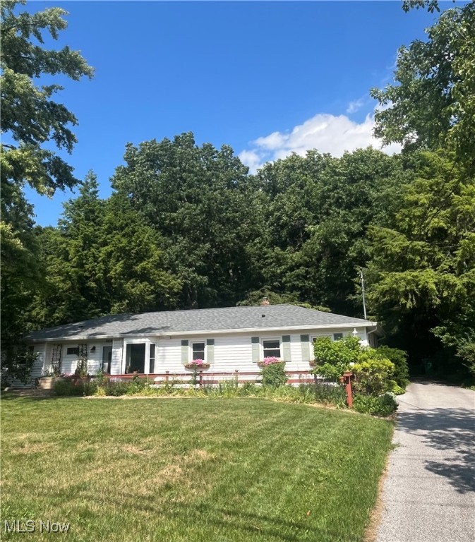 This beautiful ranch home is situated in the heart of Mentor in a quiet neighborhood. Everything is clean and updated inside, including: the two full bathrooms, the kitchen, the appliances, the flooring and paint. You will also find a huge laundry room, an attached garage, a sunny bay window, and the best views from your living room couch. Outside you'll find beautiful perennials that mean recurring color to enjoy, and your own private oasis in the lovely backyard. Enjoy the soothing sounds of flowing water from the small decorative pond, spend some time in the garden, then sit and relax in the large hot tub. There is an open lawn space as well for games and running around. Finally, there is a cute spacious shed for storage, deep enough to fit kayaks even. The yard is bordered by a strip of woods and is adjacent to Blackbrook Golf Course. Near LakeTran's Park & Ride for those downtown rides. Plus find yourself near Mentor's paved bike path system....take a stroll or bike ride to the nearby Lagoons, or to the popular summer concerts of Mentor Rocks. Get in before summer is in full swing!