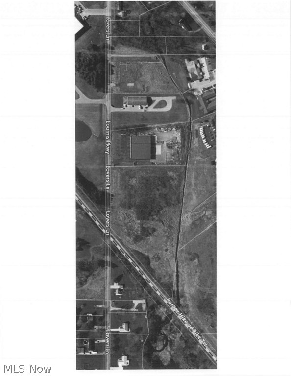 Approximately 6.580 Acres Vacant Industrial Land available. Lot is irregular. 380.86 x 520.86. All dimensions and acreage are subject to survey. Adjoins the rail line and hike and bike trail. Located in an area of Industrial Businesses. Close to everything. Minutes from Ohio Turnpike, SR 14, Sr 88, Sr 44, and I76. Great location for your new business. Can be divided at a cost of $40,000.00 per acre.
