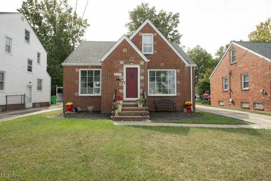 Wonderfully-renovated brick Cape Cod with over 1400 sq ft of living area, 4 bedrooms and 2 FULL baths! Extra large yard, plus a 2-car garage with additional carport. Kitchen includes newer cabinets, counters, and flooring, all about 1 year old (stove and dishwasher to be installed). Luxury vinyl plank flooring flows throughout the first floor, and new carpet was just installed upstairs (2024). Other features: new roof, less than a month old, 1st floor bedroom and full bath for possible 1-floor living. Furnace installed in '24, ready for AC to be added (but seller will include a window unit), living/dining area includes a fireplace, newer hot water tank, upgraded electric panel, full basement--great for storage. Convenient location near schools, shopping, freeway access, just minutes to Downtown Cleveland.