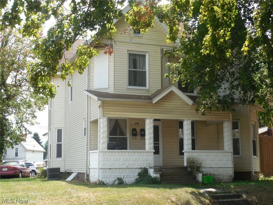 This is a duplex, with an upstairs and downstairs unit.  Both tenants pay 350.00 a month.  The upstairs has air conditioning unit.  Downstairs has window units that belong to the tenant.  There is access to the basement from outside the house.