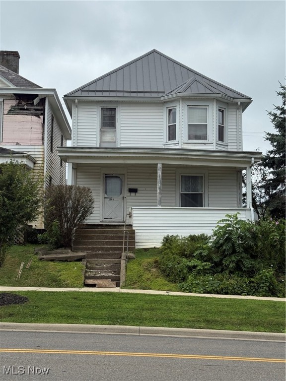 Just minutes from the hospital and other local conveniences, this home is ready for someone to bring it back to life. It offers solid basics with a newer metal roof (2020), updated vinyl siding, and mostly newer windows already in place. The interior will need updates throughout, but it’s a great chance to customize and build equity, whether you're an investor or a first-time buyer looking for a project. Detached two-car garage provides added space and functionality. Sold as-is.