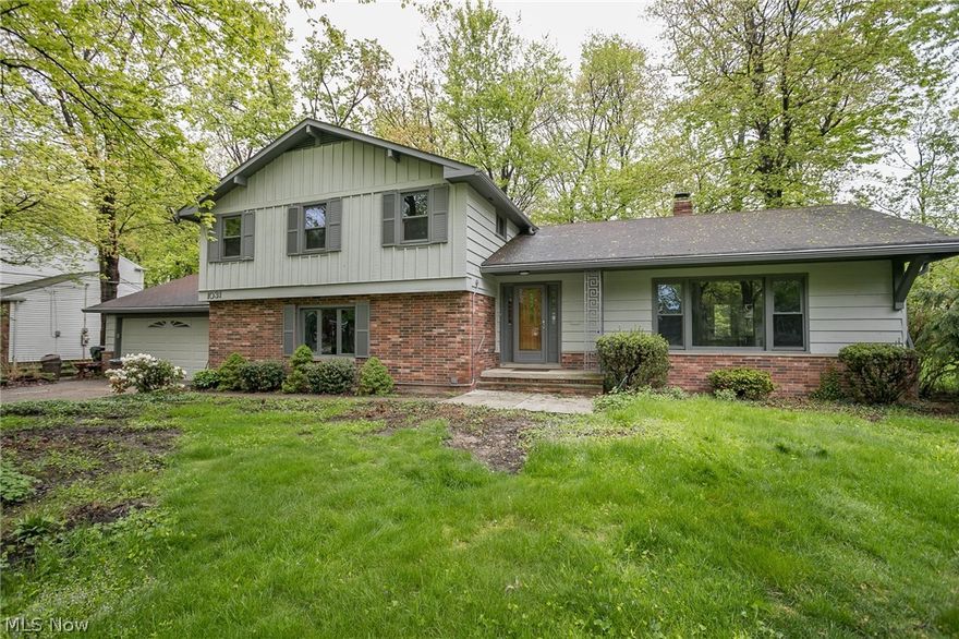 Beautifully remodeled 3/4 bedroom,2.5 bath, 4 level split. Newly remodeled kitchen with white shaker cabinets, quartz counter tops, tile back splash, all new sppliances and wood flooring. Living room has vaulted ceiling, recessed lights and wood floor. Formal dining room.  First floor family room with recessed lighting, refaced fireplace and access to sun room.  First floor bedroom/den and additional remodeled half bath.  First floor laundry room.  Remodeled master and main bathrooms.  New light fixtures throughout. Newly painted interior and exterior.  Deck off sun room.  Partially finished basement.  Heavily wooded yard.