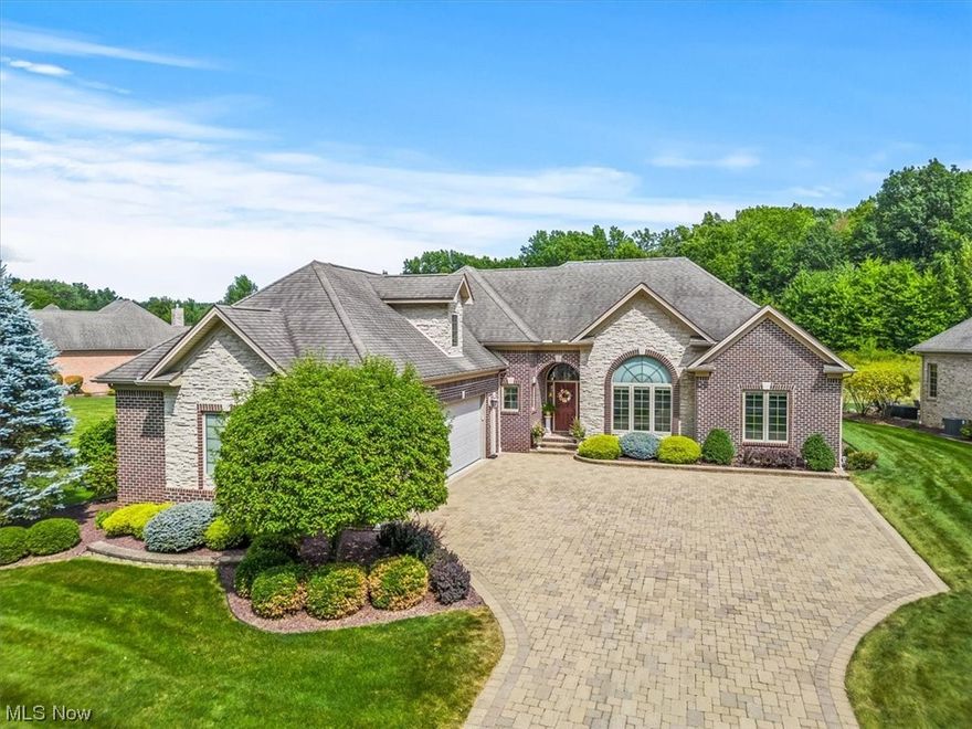 Spectacular 3 bedroom, 2.5 bath in Villa Di Tuscany.  Open floor plan with a large great room with gas burning fireplace, huge kitchen, master bedroom with large bathroom, warm sunroom with an awesome view and a first floor laundry.  Home has cherry stained woodwork throughout.  Updates to include master bath with new quartz, all oiled brass fixtures (2022), guest bathroom with new marble and fixtures (2022), powder room with brass fixtures (2022), new appliances (2022 - Fridge, stove, washer and dryer), new furnace and thermostat (2022) and resanded driveway (2023).  Unfinished bonus room over the 3-car garage, 30x15 paver patio.  This will not last long!