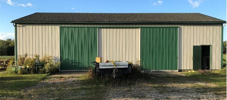 Property features 2.036 acres of land that includes a 36'  x 64' pole barn built in 1997.  The barn has 100 amp electric service, dirt floor, 2 sliding doors and a walk in door.  there is a drilled well on the property that is not in use.  rural water is available at the road.