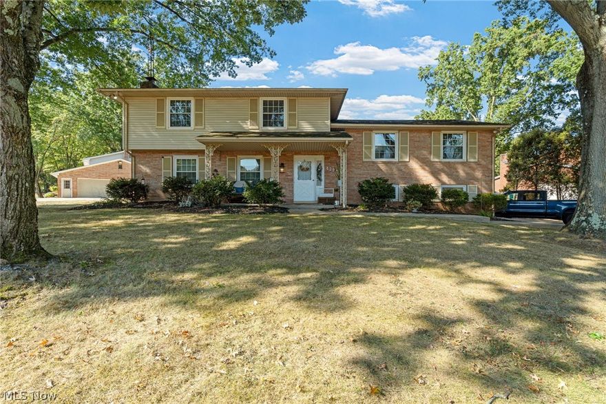 Welcome home to this wonderfully maintained split-level, offering the perfect blend of space and convenience. Boasting over 2,100  square feet, this 3-bedroom, 2.5-bathroom residence is ready for its new owner. From the foyer, you'll find a HUGE living room area with laminate flooring and a brick fireplace surrounded by built-ins. Enjoy the bonus room with cabinet/storage options that lead to a heated sun room perfect for enjoying the weather year-round. Rounding out this level, you'll find a laundry room and a 1/2 bath with a single vanity boasting beautiful countertops and cabinet space. Stepping up to the main level, you'll find a large, welcoming dining room with built-ins and easy access to the eat-in kitchen, making entertainment a breeze. Speaking of the eat-in kitchen, you'll find ample cabinet space and an additional dining area that leads out onto the back deck. The 2nd level houses three wonderfully sized bedrooms, including a spacious master suite with its own private bathroom. A hall full bath is shared with the other two bedrooms. Last, but not least, is the partially finished basement, which includes a bonus room and plenty of storage. The exterior is equally impressive, with the home boasting a nicely sized paved driveway that leads to the two-car attached heated garage. The backyard is such an amazing space, fully fenced for privacy and safety. There is also a shed for outdoor storage. Situated just minutes from the Belden Village shopping district and major highway access, you're never more than a short drive from the best dining and amenities in the area. Don't miss your chance to see this beautiful home; schedule your showing today!