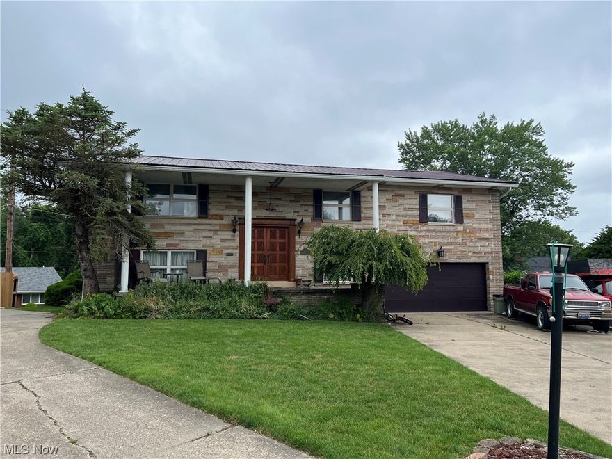 Welcome to this charming 3 bedroom 3 full bath brick split level home sitting on a .18 acre parcel. Main floor consist of  3 full bedrooms and 2 full baths with a large living room, formal dining, and eat-in-kitchen. Basement has a large finished rec-room that leads out to the sunroom. 2  car garage with extra  storage room in the back. Downstairs has a finished room that could be used as a 4th bedroom but, has no closet.