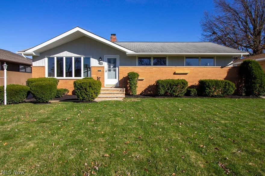 Completely updated ranch home in Parma Heights is move in ready!  As you enter the home through the front door you will notice the beautiful refinished hardwood floors and neutral paint throughout.  The spacious living room with vaulted ceilings offers plenty of sunlight with recessed lighting.  The formal dining room is perfect for entertaining allowing access to back patio and providing plenty of space to host your next gathering with family and friends. You will be impressed by the elegantly updated kitchen.  The kitchen provides brand new stainless steel appliances, gorgeous granite countertops complimenting the subway tile backsplash, wood laminate flooring and new cabinets.  This ranch style home at 1415 square feet has four bedrooms with hardwood flooring and plenty of closet space for your storage needs.  Both bathrooms on the 1st floor have been completed updated.  The full bathroom on the main floor has been updated with new flooring, bathtub and vanity.  The steps leading to