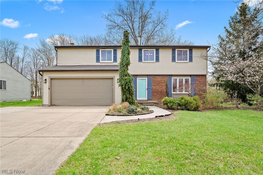 Beautifully maintained 4-bedroom, 3-bath Colonial in the sought-after Strongsville City School District offers the space and functionality today's buyers are looking for. The inviting main level features a spacious great room, a well-appointed kitchen with updated two-tone cabinetry, and a bright living room anchored by a gas fireplace — perfect for both everyday living and entertaining. The dining room and kitchen showcase laminate flooring, while four generously sized bedrooms on the upper level provide comfortable accommodations for the whole family, served by two full baths upstairs and a convenient half bath on the main floor. The partially finished basement adds valuable bonus space with a dedicated recreation room, and lower-level laundry adds everyday convenience. Outside, a pergola-covered deck overlooks a private, tree-lined yard on an expansive 0.33-acre corner lot, complemented by a storage shed and chain-link fence. The attached 2-car garage and paved driveway complete the package. With central air, gas forced-air heat, vinyl siding, and a fiberglass roof, this well-rounded Strongsville home checks every box for comfortable suburban living.