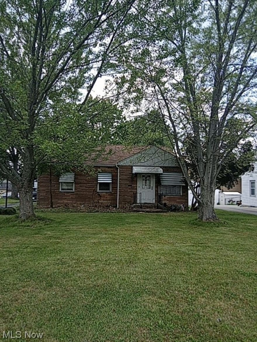 Heart of Boardman..3 Bedroom fixer-upper! This home has the ability to have 1700 sqft,with the basement having been remodeled in the past with drop ceilings and wood paneling surrounding the pool table area, furnace,hot water tank and bathroom. . It has a full bathroom and a second Kitchen in the basement as well. This home has an addition, 12x18 off the kitchen and connecting to the first 1.5 car garage. There is a second 1 car garage as well. Ready for your remodel and renovations to this property in a prime location.