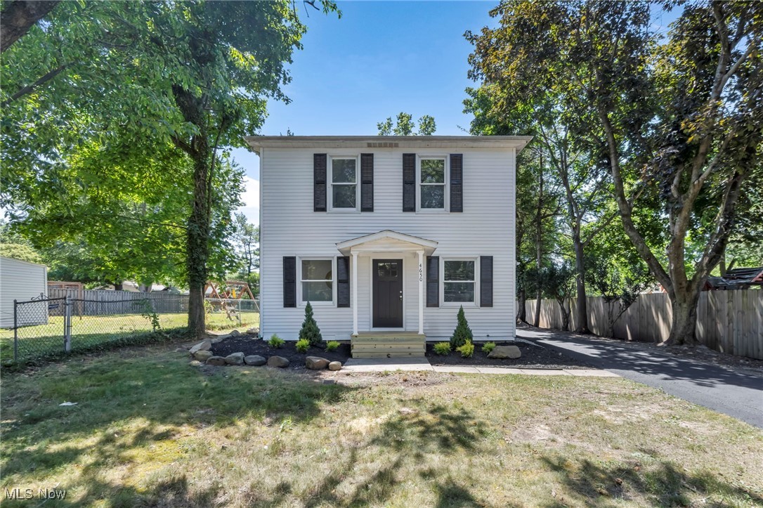 FOUR bedroom and THREE FULL bath colonial sitting back on a 1/4 acre lot in South Euclid. Walk in the front door and notice many updates including Fresh paint, New vinyl flooring and carpet, an updated kitchen with Antique cabinetry, Granite counters and SS appliances. Sliding door off the kitchen to your backyard. 2 first floor bedrooms and a full bath. Upstairs has another 2 full bedrooms and 2 full bathrooms. The master ensuite has an oversized bedroom, walk-in closet and ensuite bath. The other bedroom is across the hall from the other full bath. This is an amazing opportunity to move into a great home in South Euclid.