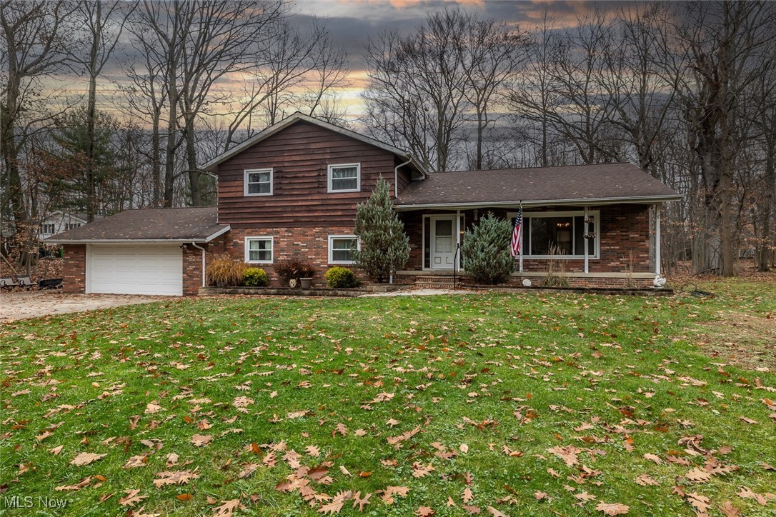 Spacious Split Level with Attached 2 Car Garage, Situated On Over An Acre! 4 Good Size Bedrooms and 1.5 Baths Which Includes a Large Master Bedroom with 3 Closets and Hardwood Floors. Nice Size Kitchen with Appliances, Spacious Living Room & Dining Room. Great Family Room With Hardwood Floors, Gas Fireplace, and Slider Doors Out To Backyard. Lots of Storage Space, Attic, Separate Laundry Room, & Basement With 2 Levels. New Windows, Newer Hot Water Tank, Furnace, and Central Air Unit. Great Location. Add Some Updating & Personal Touches To Make This Your Dream Home!