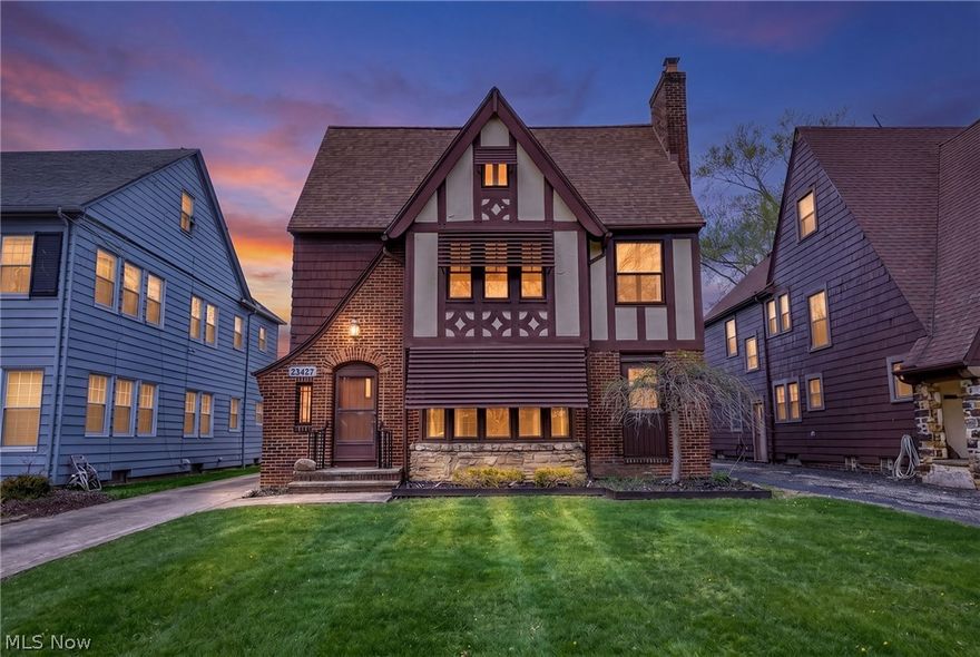 Welcome to this charming brick Tudor duplex in Shaker Heights, where timeless character blends seamlessly with modern comfort. This picturesque two-family home offers a versatile opportunity—live in one unit while generating rental income from the other, or add a solid asset to your investment portfolio in a highly walkable neighborhood. The inviting first-floor unit features 2 bedrooms and 1 full bath, highlighted by gleaming hardwood floors, a classic fireplace, and an updated kitchen with granite countertops and included appliances. Upstairs, the expansive second unit spans two levels, offering 4 bedrooms and 2 full baths, along with a second fireplace and a beautifully remodeled (2026) kitchen featuring white cabinetry, quartz countertops, and stainless steel appliances. Recent updates enhance both style and functionality, including new carpet on the third floor (2024), refinished hardwood floors on the second floor (2024), and fresh paint throughout the second and third floors (2026). Each unit enjoys its own private sun deck—perfect for morning coffee or relaxing evenings—while original leaded glass windows add warmth and storybook charm throughout. Newer furnaces, central air systems, and hot water tanks provide peace of mind, complemented by a well-maintained detached garage. Ideally located, this home is just a short stroll to the vibrant Van Aken District for shopping and dining, with convenient access to public transit for an easy commute downtown. Schedule your private showing today! Point of Sale violations will be compliant prior to closing.