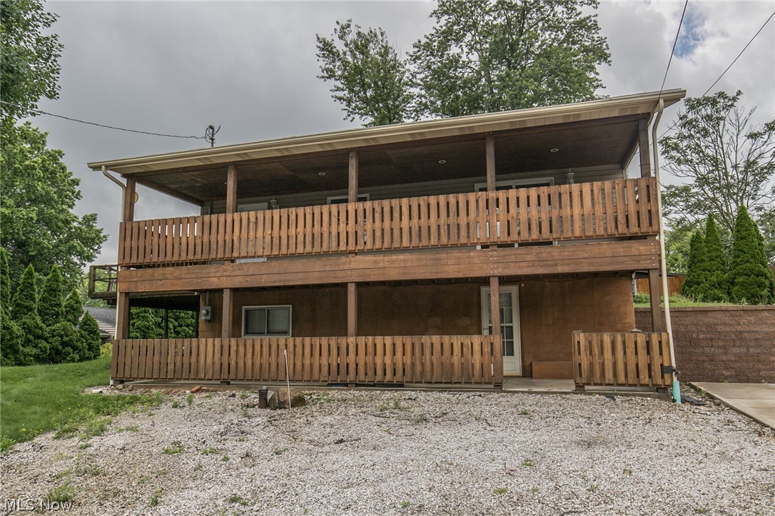Beautiful views of Brady Lake!! Sit on your oversized, covered deck over looking Brady Lake. This ranch style home has two good sized bed rooms and one bath with a walk out lower level. The large garage is an added bonus! Call today for your private showing!