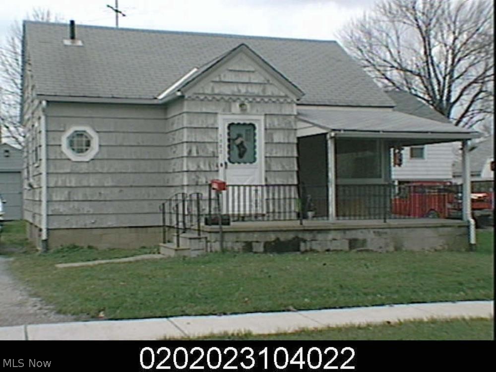 Bungalow style home with full basement. Main floor with a full bath and bedroom. Upper level has dormer room for one bedroom. House needs work. detached garage.