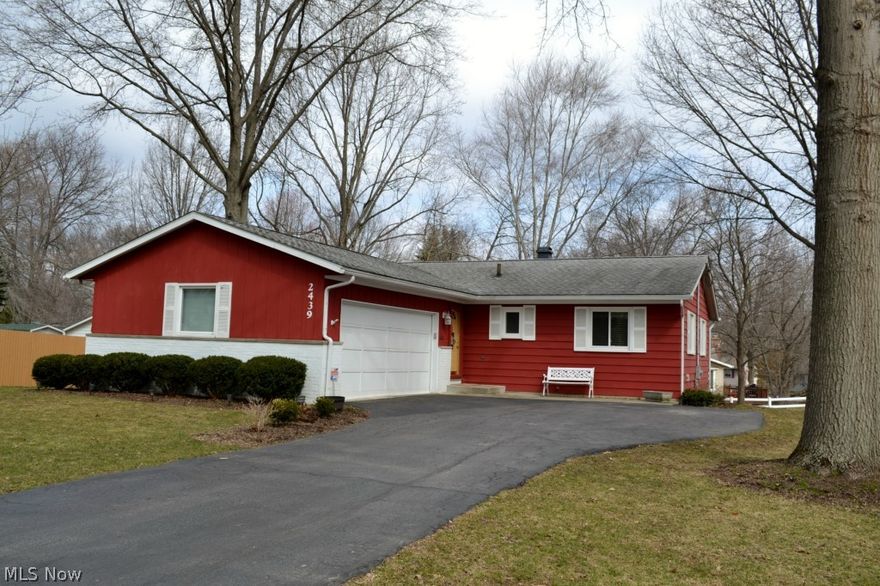 Wow! What a house! This 3 BR, 2 Bath Ranch has been completely updated! Spacious, open floor plan!  Large, eat-in, fully applianced kitchen with breakfast bar and built-in desk area opens to the large great room. Master Bedroom features an attached full bath that has been totally remodeled! Two additional bedrooms and a remodeled main bath are also on the first floor. Both bathrooms feature new fiberglass tubs, sink, vanity, toilet, shower doors and flooring. Finished lower level includes a family room,  office/4th bedroom,  laundry room and tons of storage space! Relaxing Sun Room opens to the deck. Park-like backyard with mature trees. Attached, 2 car garage with a new concrete floor. Other updates include: new furnace and A/C, vinyl windows, glass block basement windows, garage door opener, attic insulation, electrical panel, wiring, and light fixtures. All this plus beautiful, neutral decor and it is absolutely immaculate! Quiet street close to shopping and schools! Quick access to