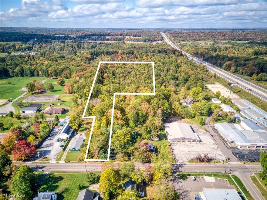 Almost 7.5 acres of land in Windham, Ohio! This property is currently zoned as mixed use, but after speaking with Windham City Zoning, this property may be approved for residential use per code 1184.04
1184.04  CONDITIONALLY PERMITTED USES.
   Subject to Chapter 1149, the following uses are conditionally permitted in this district:
   (a)   Child or Adult daycare facilities;
   (b)   Retail facilities;
   (c)   Any use similar in nature to a use permitted in this district (but not a conditionally permitted use), pursuant to the following standards shall be considered by the planning commission in determining whether a use is similar to a permitted use and if so, conditionally permitted within this district:
      (1)   The nature, predominant characteristics, and intensity of the proposed use in relation to those uses listed as permitted in this district; and
      (2)   The size, dimensional requirements, parking requirements, traffic generation potential, and other regulatory considerations normally associated with those uses listed as permitted in this district.
   If the planning commission determines that the proposed use is a similar use, then such use will be deemed to be conditionally permitted and subject to the conditional use procedures set forth in Chapter 1149.
(Ord. 2009-51.  Passed 2-23-10.)