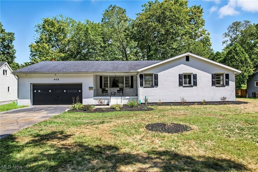 Welcome Home to Canfield!

Discover this charming 3-bedroom, 2.5-bath residence, perfectly situated in the highly-coveted Canfield Local School District. From the moment you step onto the welcoming front porch, you'll feel right at home. The interior has been completely remodeled with a basement that has been professionally waterproofed and includes a two-year warranty, ready and waiting to be finished.

Spacious Interiors for Modern Living
Inside, a generously sized living room flows seamlessly into the elegant dining room, complete with a beautiful chandelier, ideal for entertaining. The heart of the home, the updated kitchen, boasts newer stainless steel appliances, making meal preparation a delight. The cozy family room, featuring a brick fireplace and built-ins, is the perfect spot for gathering with loved ones.

Private Retreats & Outdoor Oasis
You'll find three generously proportioned bedrooms, offering ample space and comfort for the whole family. Step outside to your private screened patio, where you can relax and enjoy the serene wooded views. This home is truly an ideal blend of comfort, style, and an unbeatable location. Just steps away from schools, shopping, and parks, you'll find this home has just what you've been looking for!