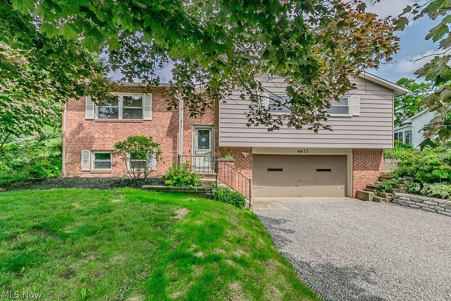 4671 Milford Dr. in beautiful Perry Township can be the place you call home!  Close to the many amenities that Lake County has to offer.  This split has three bedrooms and two full baths on the main upper level.  The primary bedroom is very large with a new ceiling fan in the bedroom and exhaust fan in the on suite.  The second and third bedrooms are a nice size with large closets.  The eat in kitchen is newly remodeled with new floor, cabinets, and appliances.  This leads to a dining/living room combination that is perfect for entertaining guests. You enter the deck which has been recently stained through the sliding doors off the dining room.  Enjoy those cold winter nights down in the lower level with a brick front wood burning fireplace. The laundry area is nice and large with utilities in the same room.  The boiler is fully functioning to keep you arm on those cold Ohio nights, as well as a new roof in 2025.  A portion of the yard is fenced in with chain link fence to keep your furry friend safe.  Bring your imagination to the outdoor landscape, with a new retaining wall and gravel drive.  Don't miss this secluded home in the heart of Perry!!!
