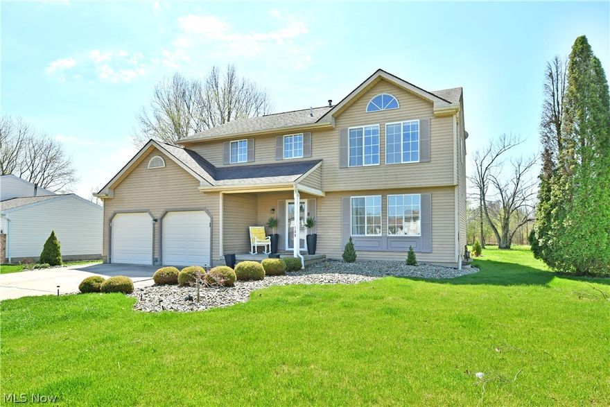 Everything you’ve been looking for and more, this fantastic Champion Township home checks all the right boxes with its hard to find, four-bedroom, two story layout! Set in a desirable local neighborhood, this attractive residence is quick to catch your eye with its warm, neutral colored exterior trimmed in lovely stone landscaping. A concrete drive leads up to an attached two car garage while the endearing covered front patio welcomes you inside. Around the back, revel in your own personal getaway to include a pergola adorned raised deck combined with a laid stone lower patio. Providing additional storage, a striking, metal-roofed storage shed completes the backyard. Through the front door, the main hall opens past the decorative staircase to find an open living room. A pair of oversized lattice windows pour sunshine across the hardwood styled flooring. Formal dining enjoys bespoke lighting choices at the far end. Opposite, a bright and boldly colored half bath is located before the rear of the home revealing its long-stretched kitchen and adjacent family room. Sunshine remains paramount as it filters in across the stone-look countertops and stainless appliances. A relaxing wood-burning fireplace completes the floor with its wooden mantle. Upstairs, the inviting bedrooms branch from the hall showcasing bright and carpeted living space. An oversized master includes a personal vanity space and walk-in closet before its full private bath. The three additional bedrooms are nicely sized and offer great closet space. A second full bath that has been updated is found mid-hallway. The waterproofed basement offers a laundry area with a washer and dryer staying plus additional storage space. Updates include: roof 2012, furnace 2016, air conditioning 2013, new kitchen appliances that stay, and a brand new outdoor storage shed. All this plus a one year home warranty!