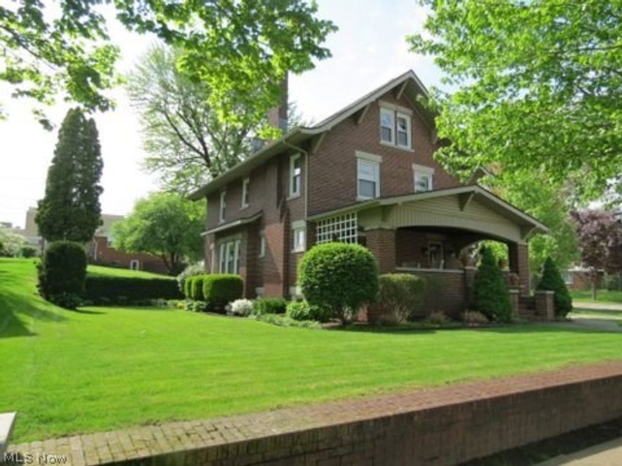A true local treasure, built in 1924 by the founder of Belden Brick, Charles Finzer. This home has retained its historical elegance and charm with original woodwork and hand craftsmanship found at every turn. Double bricked, glass French doors, built in window seats w/corner glass display cupboards in the family-size formal dining room. A charming fireplace in the living room, private office or bedroom option on the first floor, and also first-floor bath. Totally finished third floor offers a private guest space or extra entertaining area for children, or consider it a private studio/office, exercise room. You decide. Fully modern user-friendly kitchen with center island while preserving the homes integrity. Outdoor entertaining is wide open. Escape to the brick back patio, spacious front porch, or the quaint "observation porch" off the second floor master. Convenient circle side-street driveway. Detached two car brick garage. This oversized lot is exquisitely manicured and landscaped
