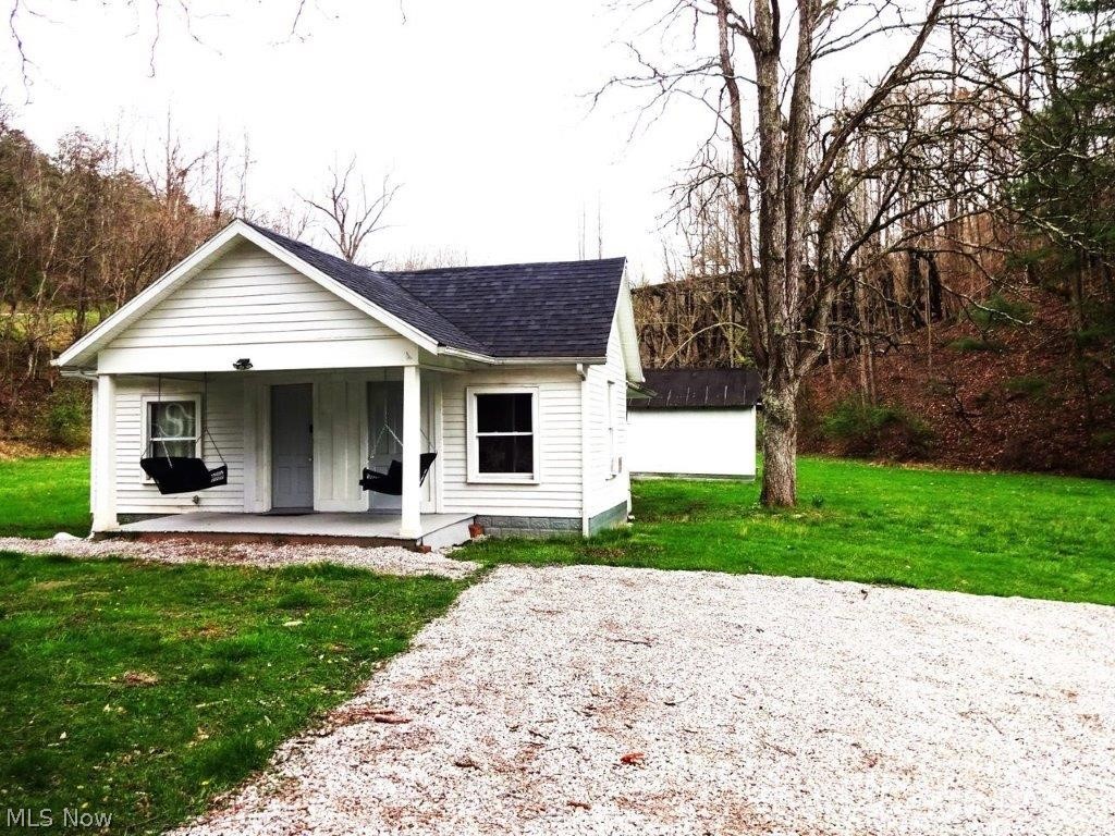 Beautiful country location, well maintained home. 30 acres. Home features many updates. 2 bedrooms/ 1 bath, living room with decorative fireplace, dining room, kitchen with appliances, laundry room with appliances. Welcoming front porch – double entry. Back porch, garden area, small stream, mostly wooded, 20x20 barn, 10x20 building 16x20 3-room building. Storage building. Excellent place to relax and enjoy life! Unique feature on property is remains of historic B&O Railroad Trestle, thus the property name of “Trestle End”. Excellent hunting. Just a few miles to town of Reedy, country store, gas station, building supply, convenience hardware store. Love country living- THIS IS IT! Must see to appreciate. Wildlife flowers. Hiking trails. Seller is offering possible owner financing to buyer with good credit approval.